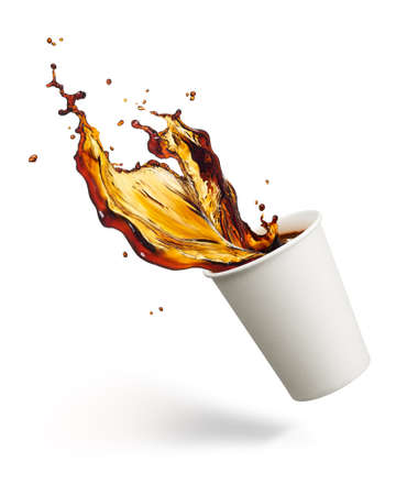 cup of coffee splashing against white backgroundの写真素材