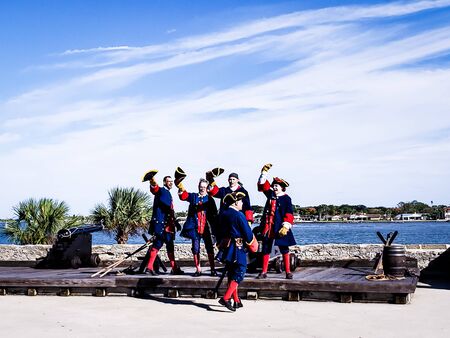 Saint Augustine, Florida, The United State - Nov 3, 2018 : The soldiers in traditional Spanish Clothes show to shooting cannon at the Castillo San Marcos is one of the oldest America cities.のeditorial素材