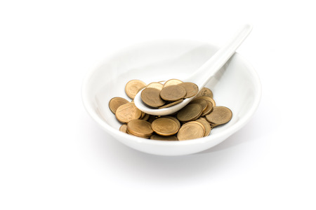Coin in a bowlの写真素材