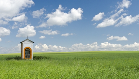 Chapel in a fieldの写真素材