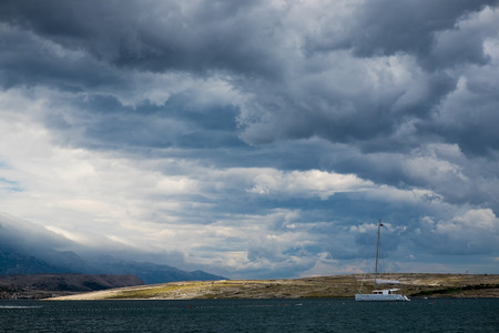 Storm clouds over the sea, the island of Pag, Croatia, Europeの写真素材