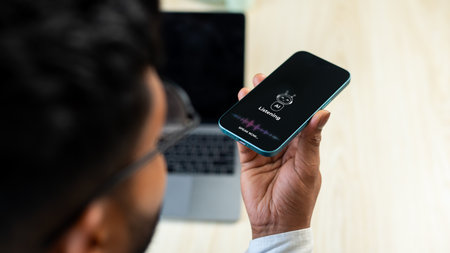 Man holding smartphone with ai assistant on screen