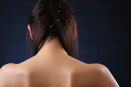 Back view of young woman with red dot on her back against dark background, Acupuncture needles in womans back, AI Generatedの素材