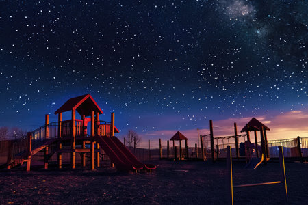A playground with a slide under a night sky filled with stars, Empty playground under a starlit sky, AI Generatedの素材