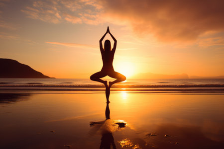 A serene woman finds tranquility as she gracefully practices yoga on the sandy shore under the mesmerizing hues of a sunset, Woman doing yoga in the beach at sunrise, AI Generatedの素材