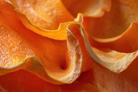 This close-up photo shows the detailed view of a peeled orange, showcasing its juicy sections and droplets, Texture detail of a ripened orange peel, AI Generatedの素材
