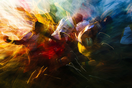 Blurry Photo of a Group of People Playing Soccer, An abstract representation of the energy, passion, and dynamism in a rugby field, AI Generatedの素材