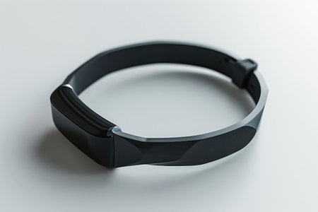 A detailed view of a black bracelet placed on a clean white surface, showcasing its intricate design and contrasting colors, Real-time health tracking wearable device, AI Generatedの素材