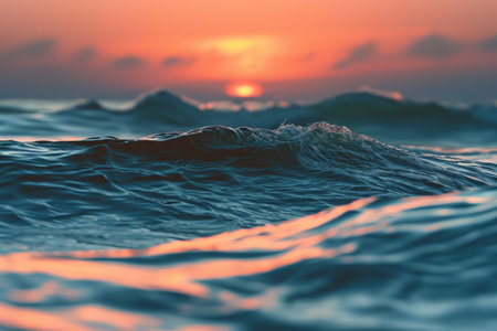 The sun is seen slowly descending towards the horizon, casting a warm golden glow over the rolling waves of the ocean, A dynamic ripple of ocean waves during twilight, AI Generatedの素材