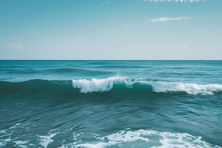 This photo captures a stunning view of a vast body of water as powerful waves crash onto the shore, A panoramic view of a peaceful ocean with rolling waves, AI Generatedの素材