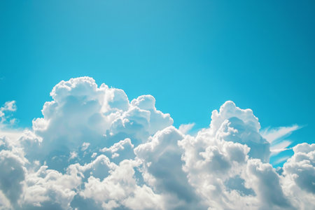 This photo captures a sky filled with a multitude of white clouds, creating a picturesque scene, A view of spacious white clouds in a bright blue sky, AI Generatedの素材