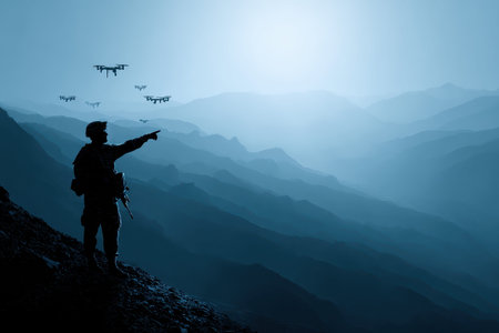Silhouette of a soldier commanding drones in mountainous terrain during a military operation at duskの素材