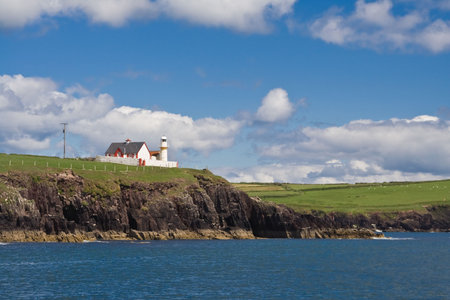The lighthouse in Dingle, Ireland.の写真素材