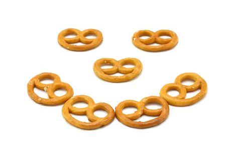 Happy pretzels isolated on white.の写真素材