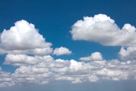 White clouds on a blue sky.の写真素材