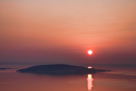 Sunset over the Goli Otok Island in Croatia.の写真素材