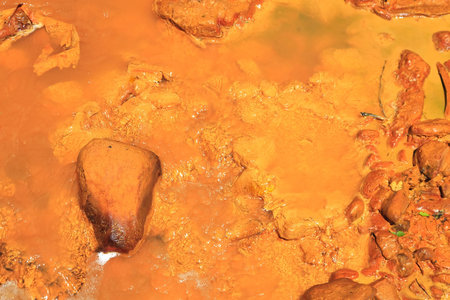 Poluted river by miningの写真素材