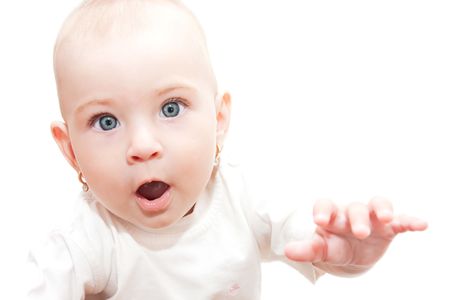 Beautiful baby girl in shockの写真素材