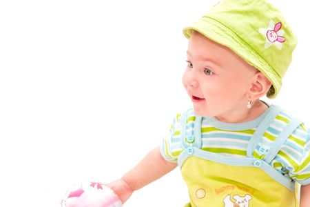 Happy beautiful baby girl playingの写真素材