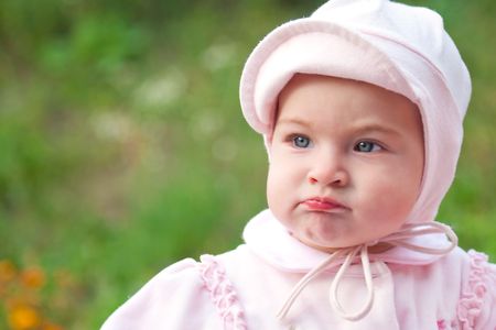 Baby girl dressed in pinkの写真素材
