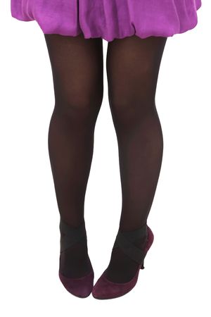 Elegant woman legs isolated on whiteの写真素材