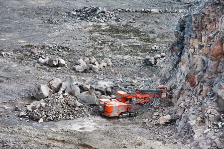 Machinery excavating at a quarry in Harghita county, Romania.の写真素材