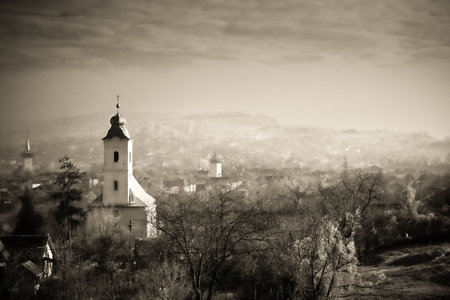 Foggy morning landscape in Hunedoara city , Romaniaの写真素材