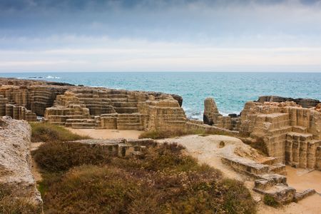 Interesting landscape of an ancient quarry by the sea at Torre Egnatia, close to Bari, in Italy.の写真素材