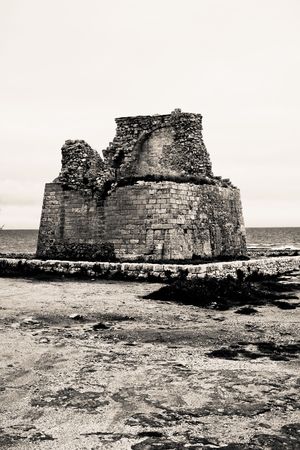 Ancient tower at Torre Egnatia in Italy.の写真素材