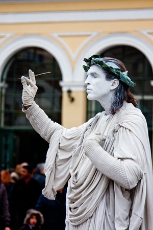 Athens, Greece - February 2010: One of the many men posing as a human statue in Monastiraki square.のeditorial素材