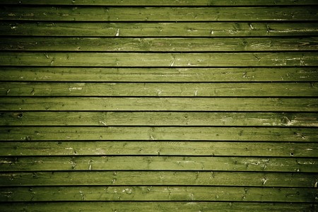Background of a grunge green wooden wallの写真素材