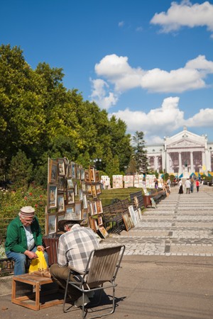 IASI, ROMANIA - SEPTEMBER 05: Artists selling their works in the National Theater's Park in downtown on September 05, 2010 in Iasi, Romania. The park has a tradition for many years to allow artists everyday to sell their work.のeditorial素材