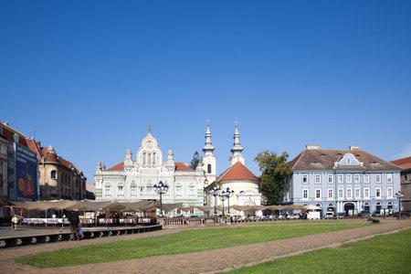 TIMISOARA, ROMANIA - AUGUST 19: Unirii square in downtown Timisoara on August 19, 2010 in Romania. Timisoara is the third largest city in Romania.のeditorial素材