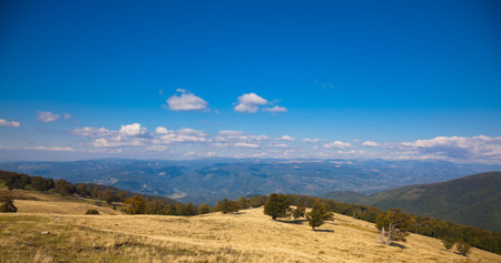 Beautiful autumn landscape from Tulisa Mountain towards Strei Valley in Retezat National Park, Romania.の写真素材