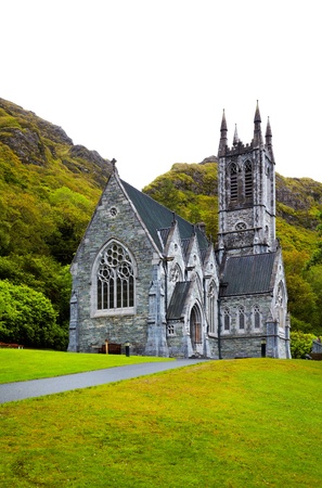Overcast view of the gothic church at Kylemore Abbey in summer, Ireland.のeditorial素材