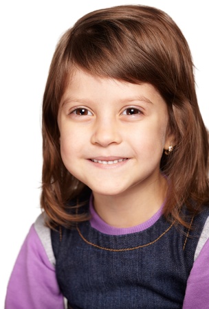 Cute little girl wearing pink hat and scarf smiling isolated on white background の写真素材