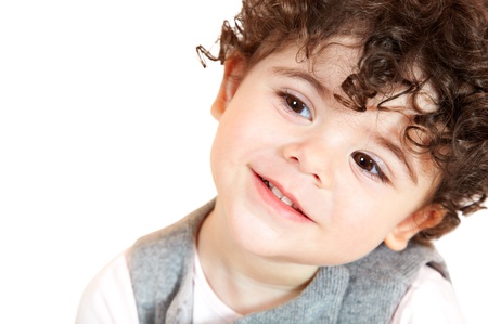 Two year old baby girl with curly hair portrait.の写真素材