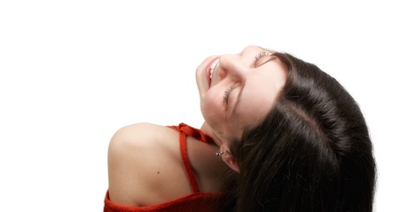 Closeup portrait of young lady with dark hair isolated on white backgroundの写真素材