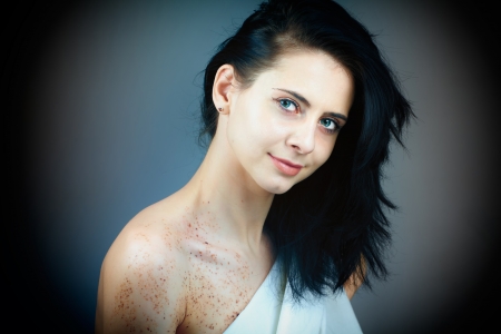 Portrait of a beautiful young woman, vintage feel.の写真素材