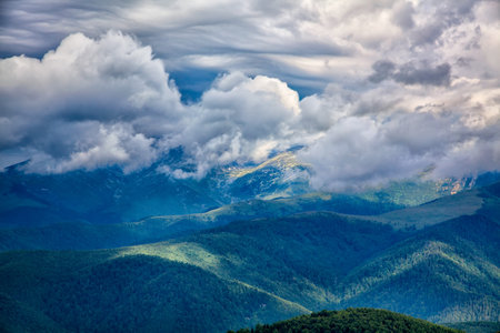 Cloudy landscape of the alpine area seen from the Transalpina road in Romania.