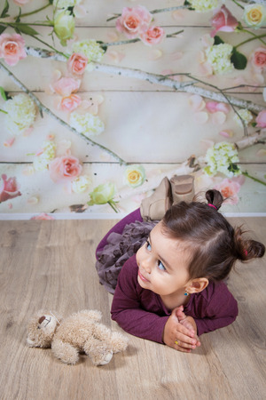 Portrait of 1 and a half gorgeous baby girl indoor.の写真素材