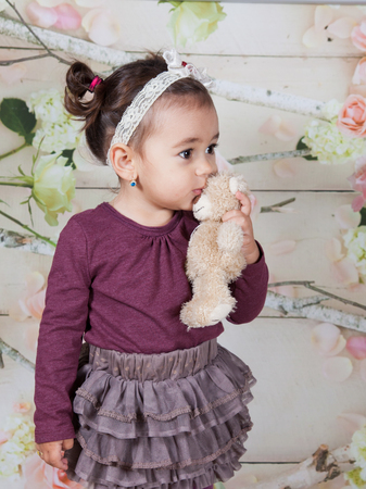 Portrait of 1 and a half gorgeous baby girl indoor.の写真素材