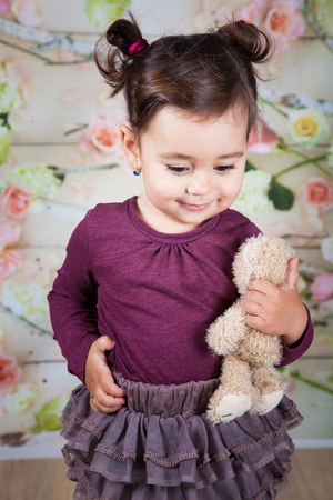 Portrait of 1 and a half gorgeous baby girl indoor.の写真素材