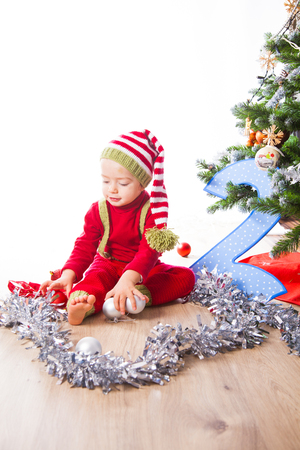 2 year old baby boy Christmas shooting in studio.の写真素材