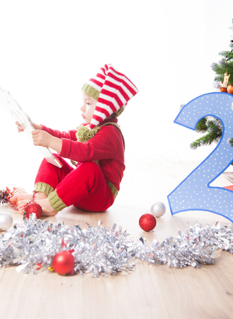 2 year old baby boy Christmas shooting in studio.の写真素材