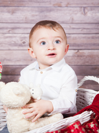 Portrait of 1 year old baby boy, Christmas theme, studio shot.の写真素材