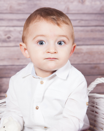 Portrait of 1 year old baby boy, Christmas theme, studio shot.の写真素材