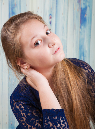 Portrait of a 10 year old girl, studio shot.の写真素材
