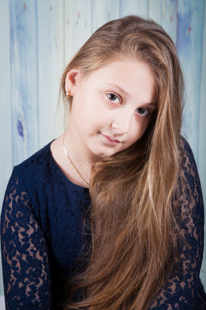Portrait of a 10 year old girl, studio shot.の写真素材