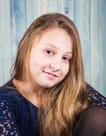 Portrait of a 10 year old girl, studio shot.の写真素材